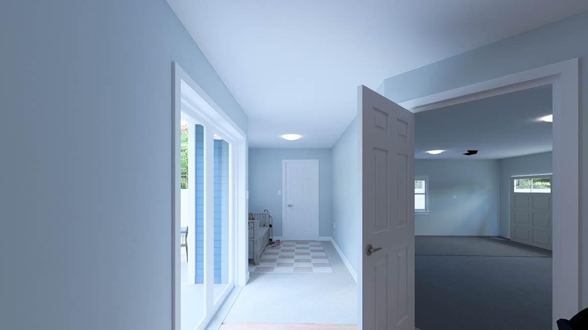 Interior view of a hallway with double doors, a single door, and an opening to a garage with a garage door.