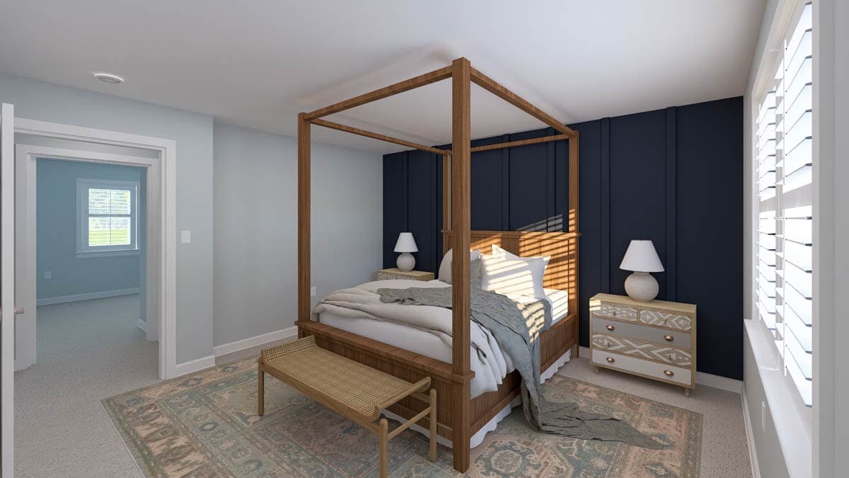 Bedroom interior with four-poster bed, paneled accent wall, and an open doorway to another room.