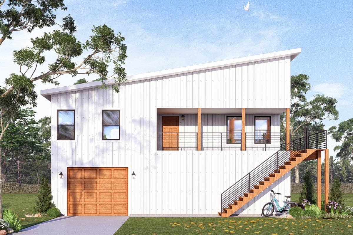 Modern house plan exterior with metal siding, two stories, garage door, balcony, and exterior staircase.