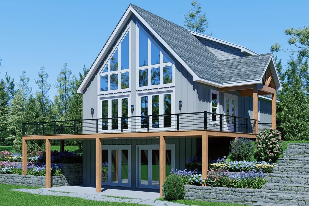 House plan exterior: Modern A-frame style with a full-height gable window and wraparound deck.