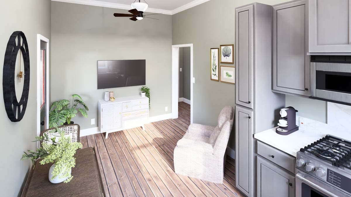 Interior rendering of an open-concept living area and kitchen with light gray cabinets, wood flooring, and a wall-mounted TV.