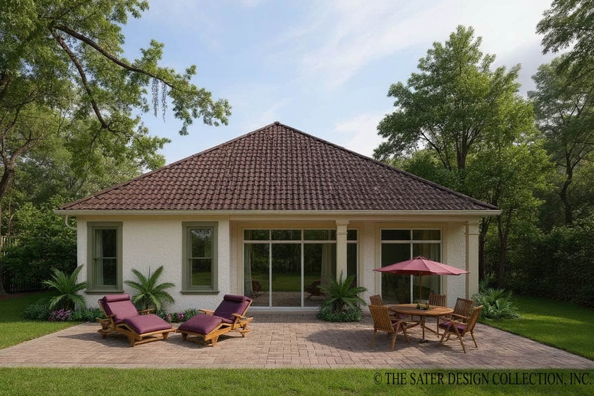 House plan exterior: One-story modern home with a hipped tile roof, stucco walls, large picture windows, and a shaded patio.