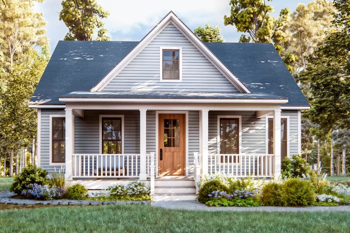 A charming, two-story house with a blue roof, white porch, and wooden door. Lush greenery and trees surround the home, set against a bright sky.