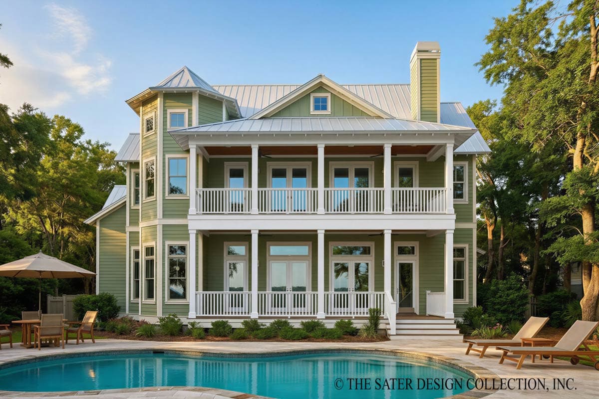 Coastal style house plan exterior featuring a two-story wrap-around porch, metal roof, dormer, and turret.