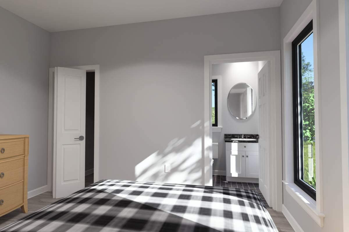 Bedroom rendering with door open to bathroom featuring vanity with mirror and exterior window view.
