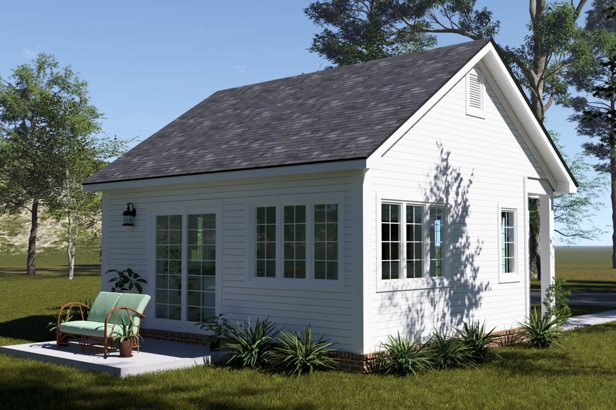 House plan exterior: White siding, gable roof with vent, multiple windows, and French doors opening to a patio.