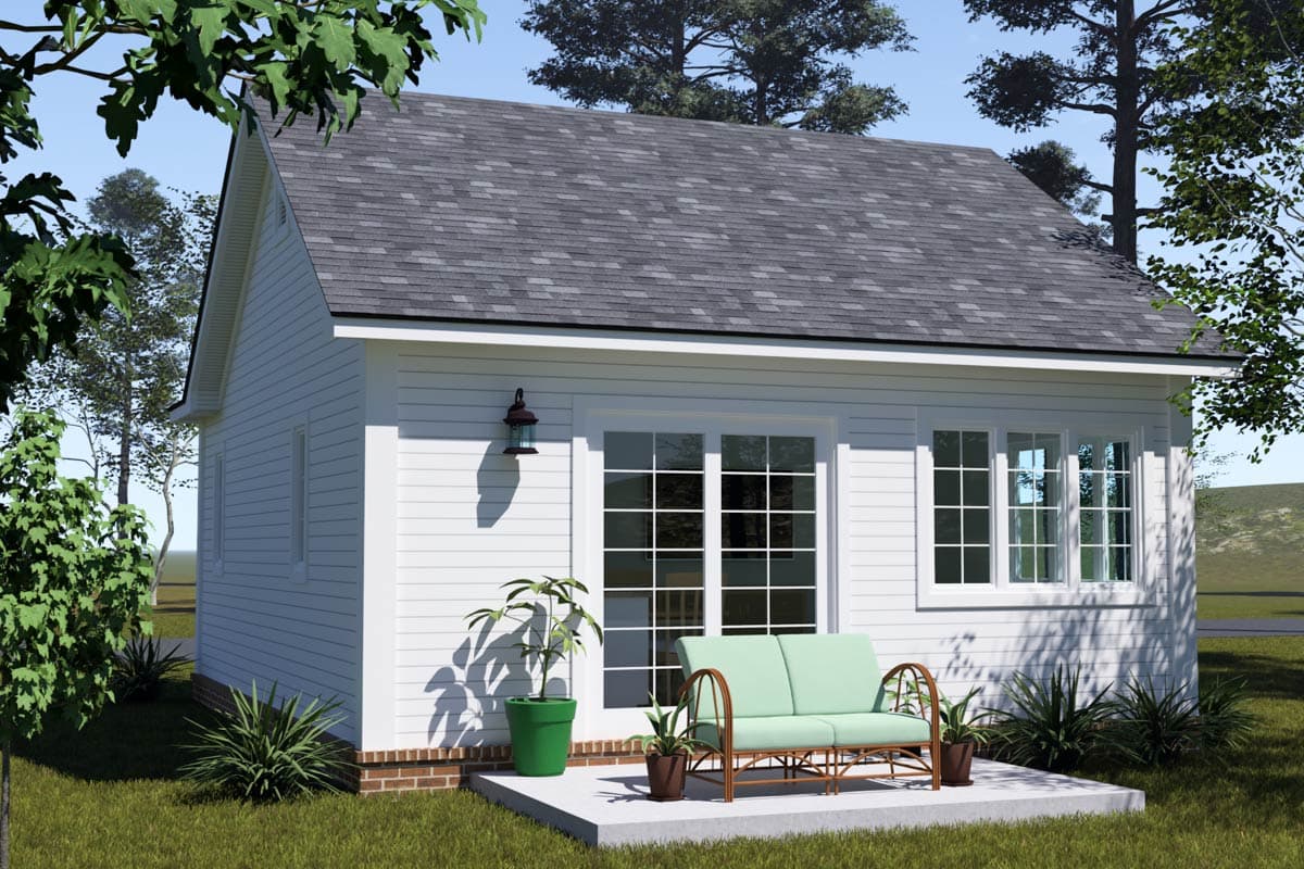 House plan exterior: One-story dwelling with white siding, gable roof, double French doors, and multiple casement windows.