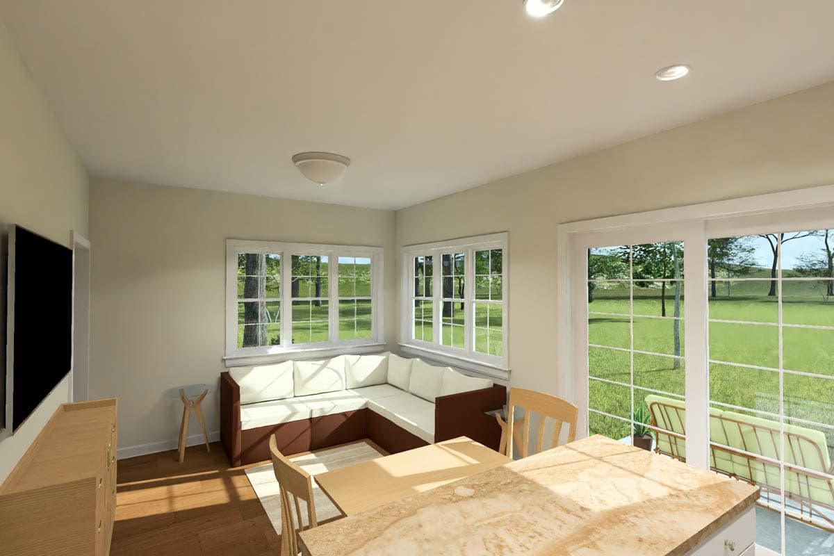 Interior rendering of a dining area with a built-in sectional bench, table, chairs, and large windows overlooking a yard.
