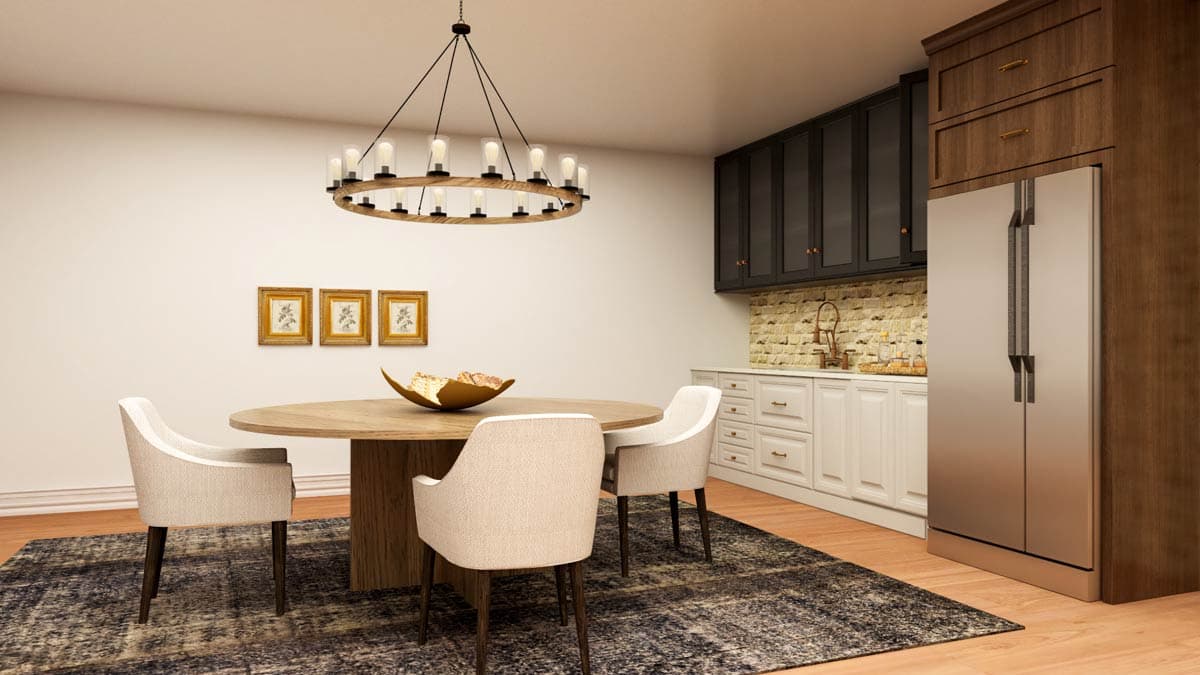 Dining area with round wood table, four chairs, modern chandelier, and adjacent kitchen with cabinetry and stainless steel refrigerator.