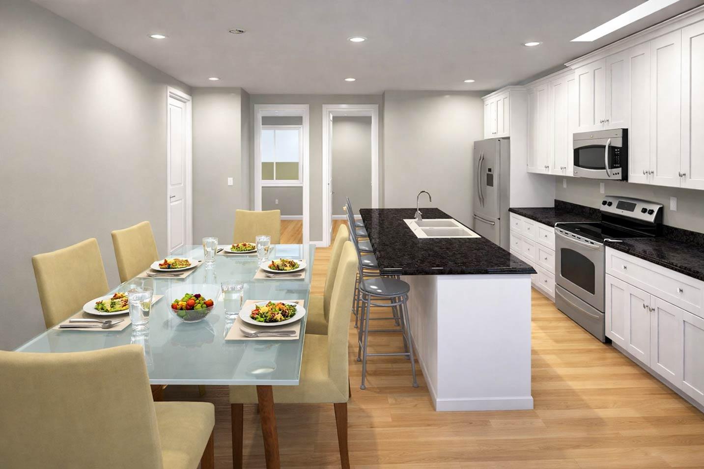 Kitchen and dining area with island, granite countertops, white cabinetry, stainless steel appliances, and a glass-top dining table.