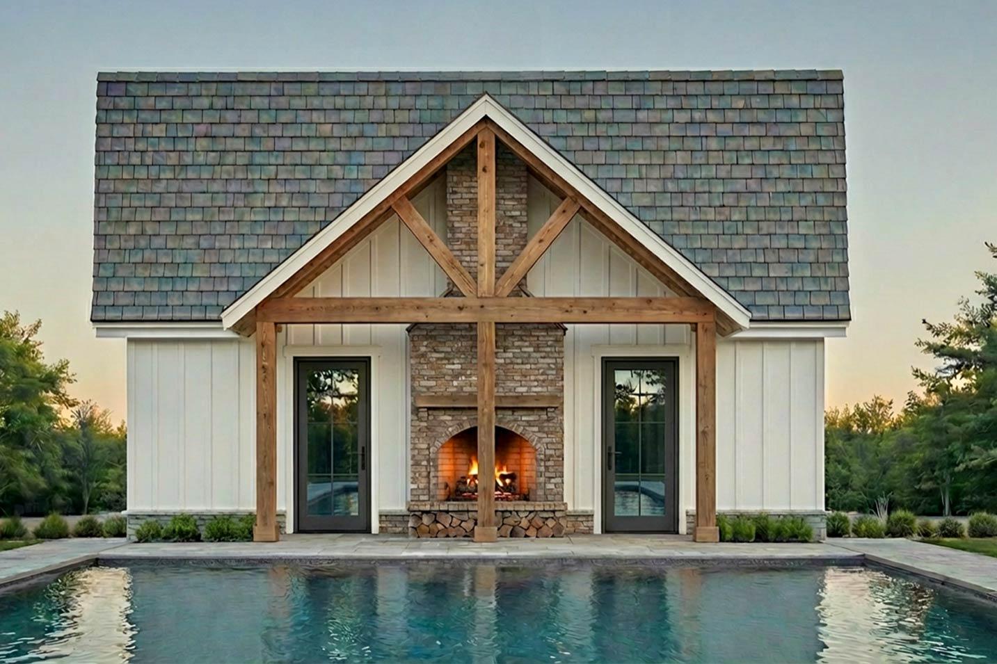 House plan exterior: Modern Farmhouse style with prominent timber frame gables, stone fireplace, and symmetrical glass doors by a pool.