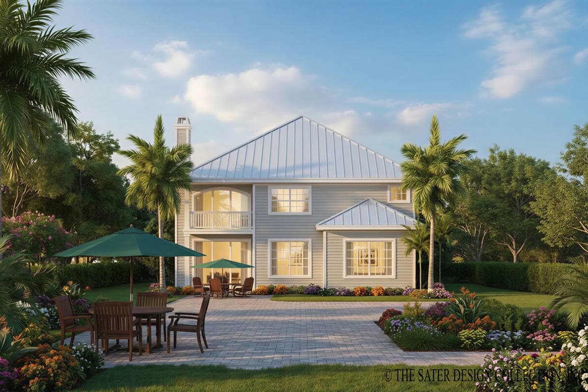 House plan exterior, two stories, metal roof, balcony, gabled dormers, and large windows.