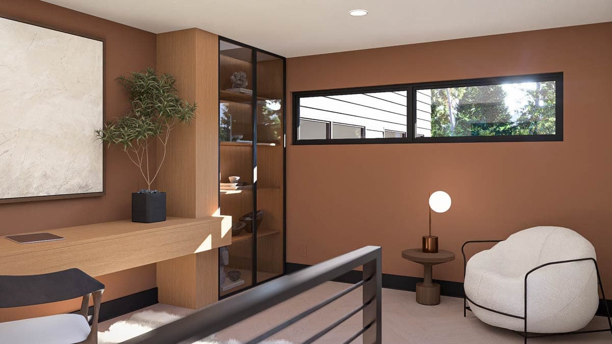 Interior view: Built-in wood desk and shelving unit with glass doors, modern armchair, and horizontal windows.
