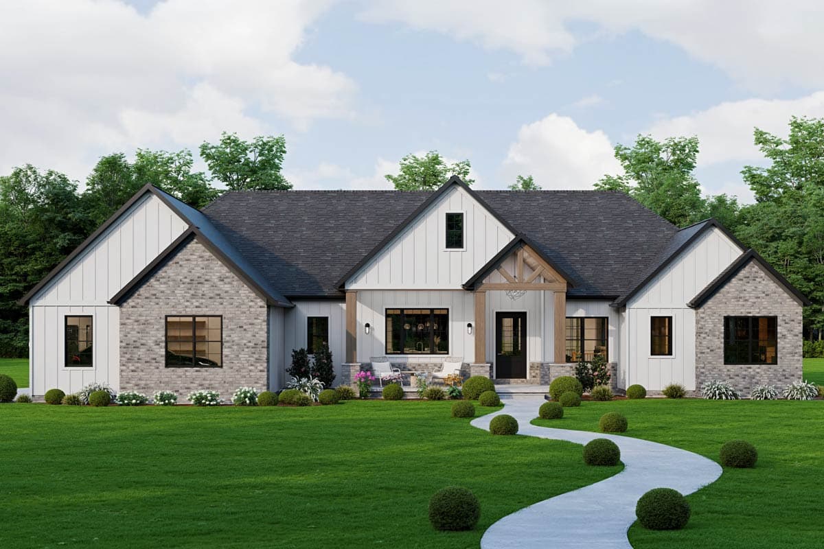 Modern Farmhouse house plan exterior with white board and batten, stone accents, gable roofs, and a covered entry with wooden beams.