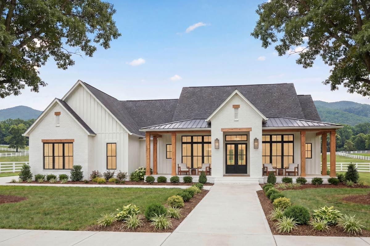 House plan exterior in Modern Farmhouse style with a covered porch, gabled roof, and wood accents. Features black window frames and door.