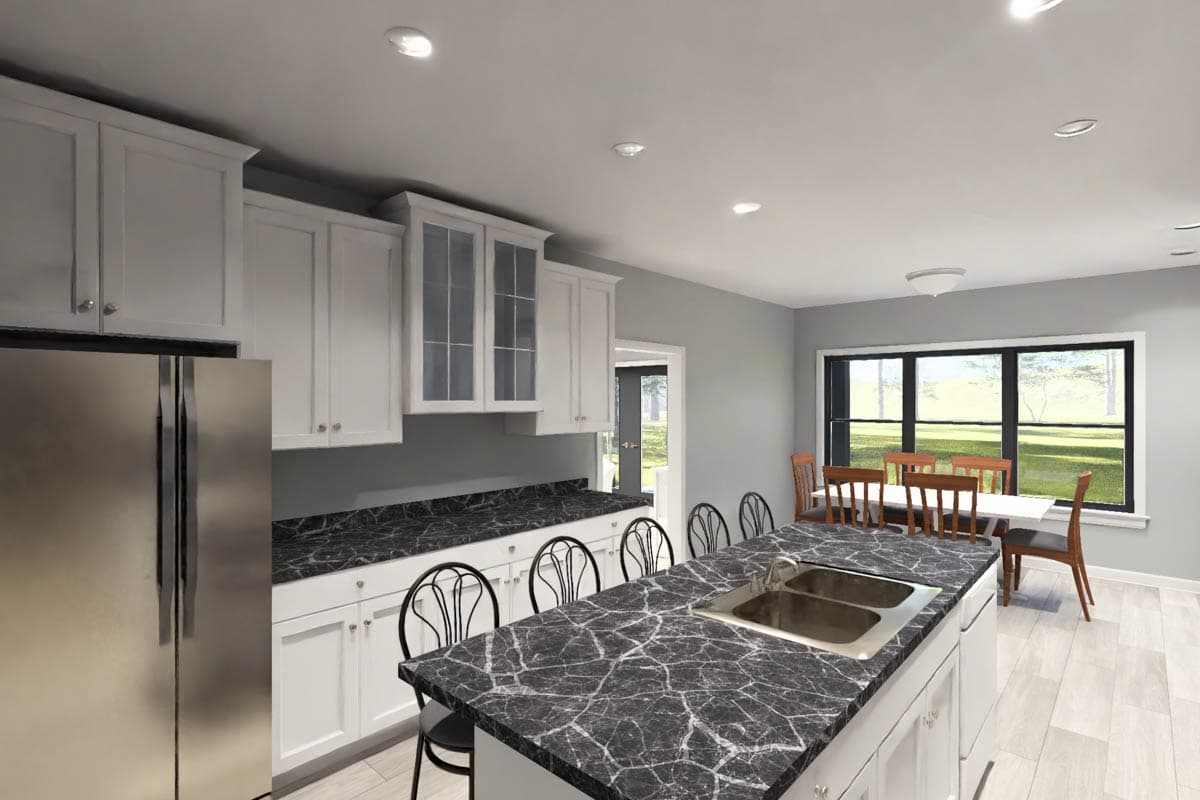 Kitchen and dining area with white cabinets, island with sink, dining table and chairs, and large window.