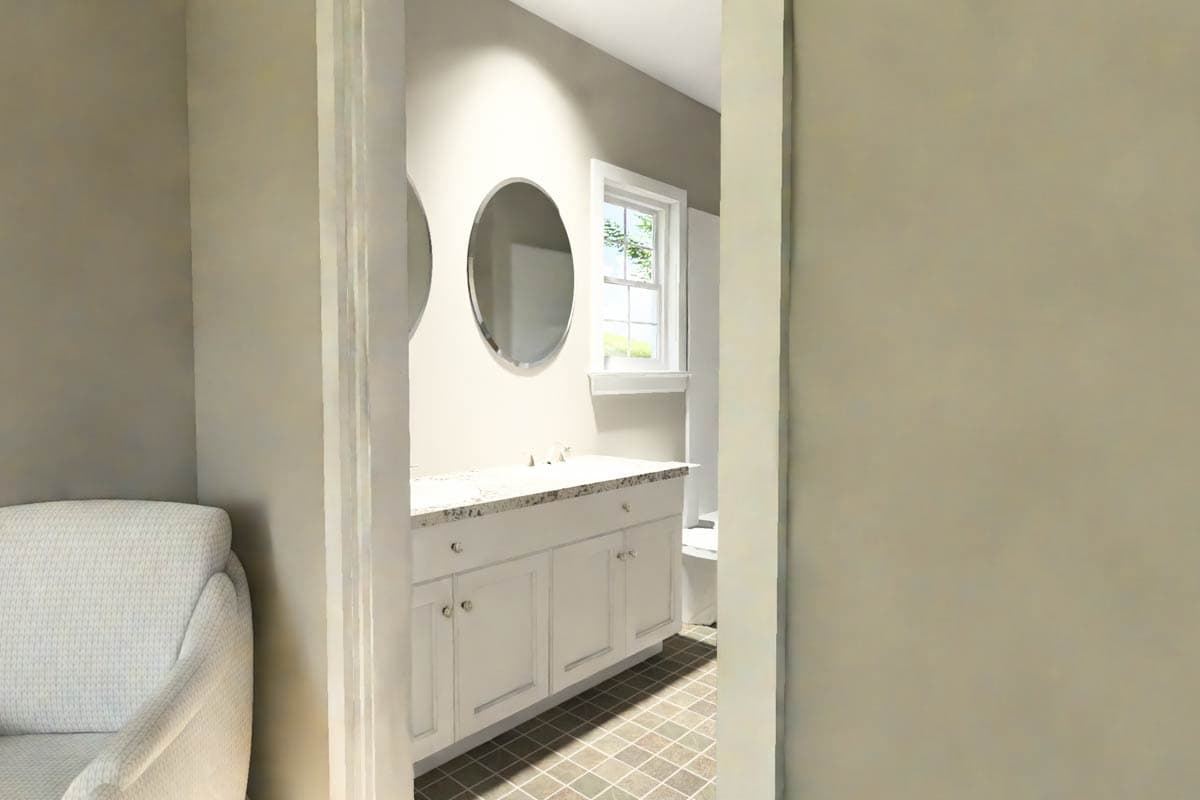 Bathroom vanity with double sinks, oval mirrors, white cabinetry, and tiled floor.