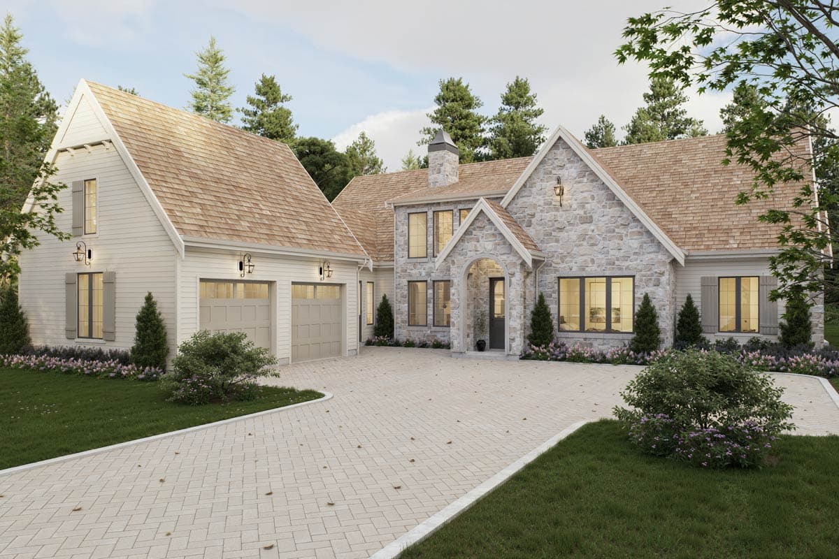 House plan exterior: Modern Farmhouse style, two stories, stone facade, attached three-car garage, prominent gables, and wood shake roof.