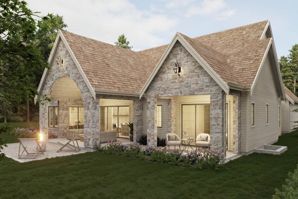 Modern Farmhouse house plan exterior with stone accents, arched entry, covered porch, and gabled rooflines.