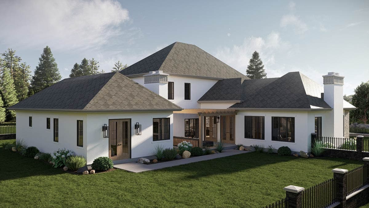House plan exterior with a white stucco finish, hip roofs, a large chimney, and covered patio entry.