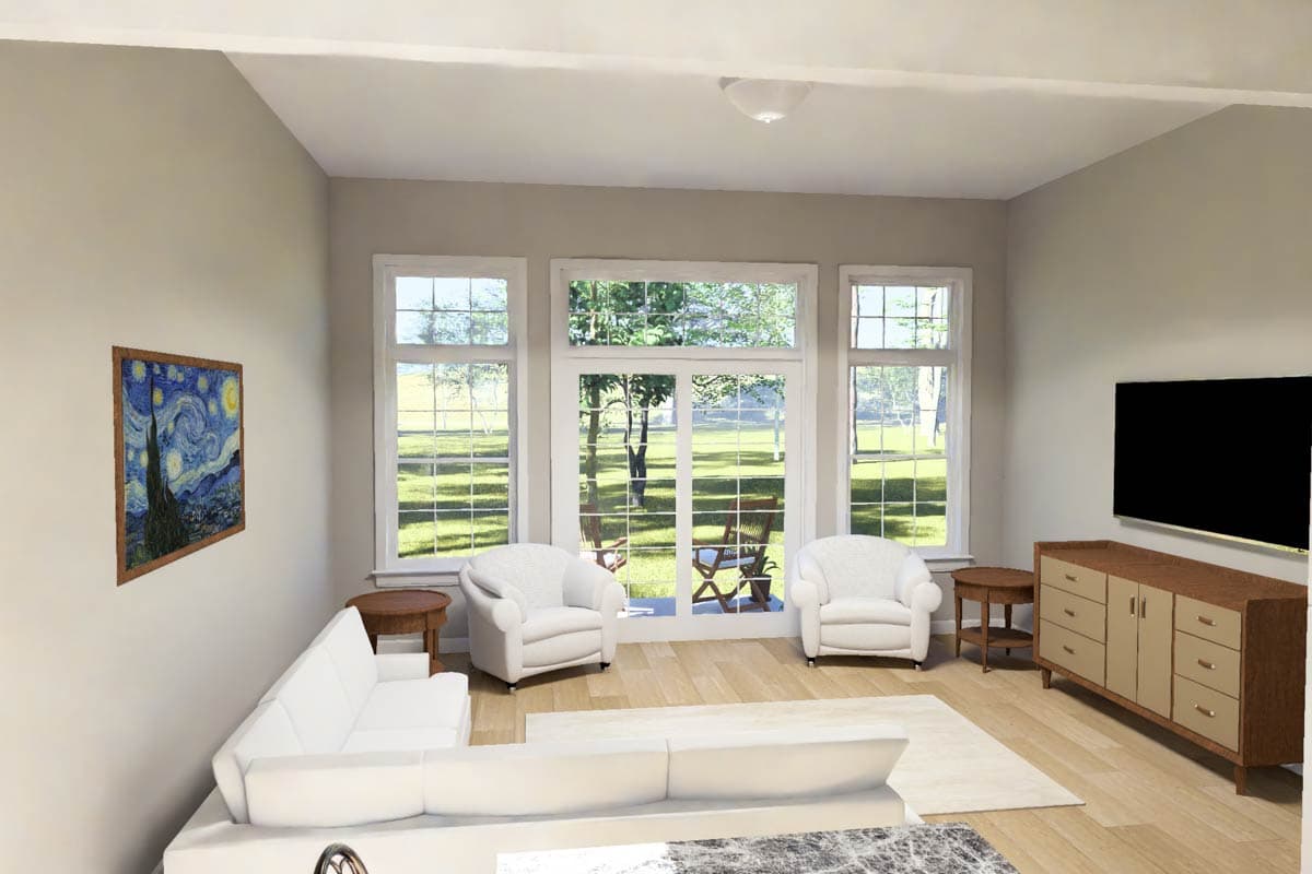 Living room with sectional sofa, two armchairs, and a credenza below a wall-mounted television.