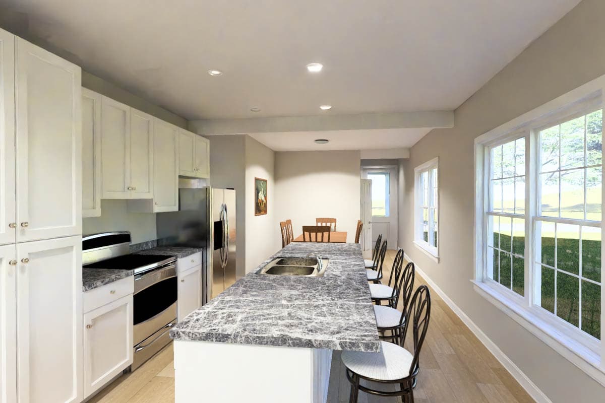 Kitchen and dining area with a large island, stainless steel appliances, and ample windows.