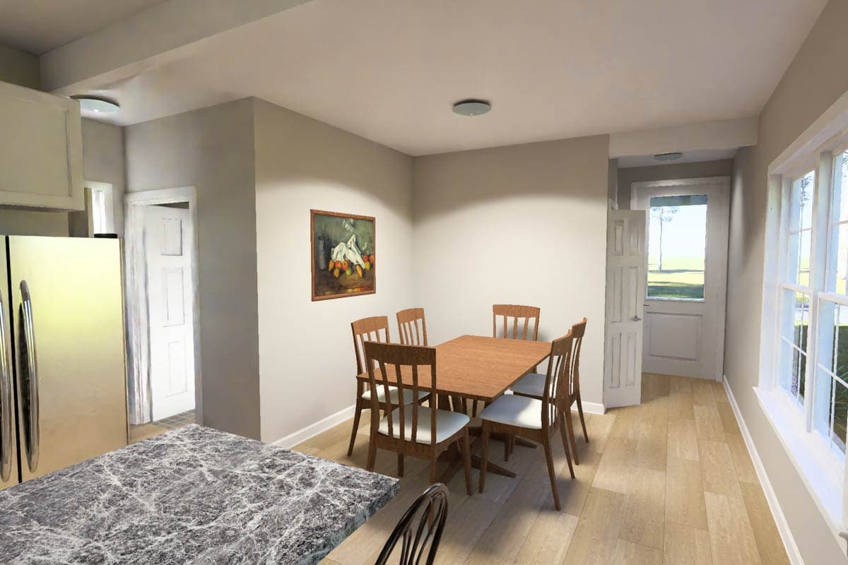 Dining area with wooden table and chairs, adjacent to kitchen area with refrigerator and door leading outside.