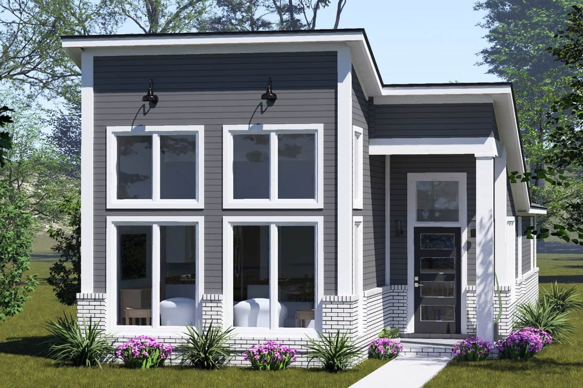 Modern house plan exterior with a prominent multi-pane front door, vertical siding, and large stacked windows.