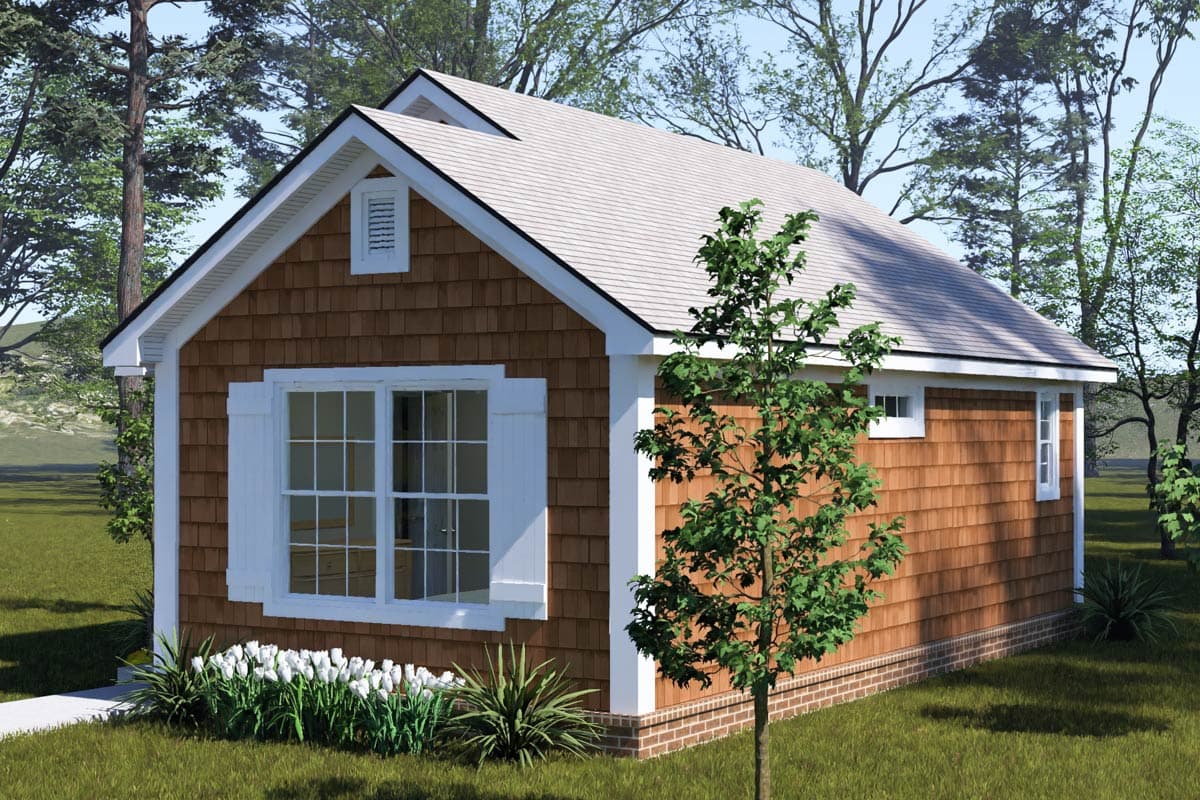 House plan exterior: Gable roof, cedar shingles, and a large multi-pane window with shutters.