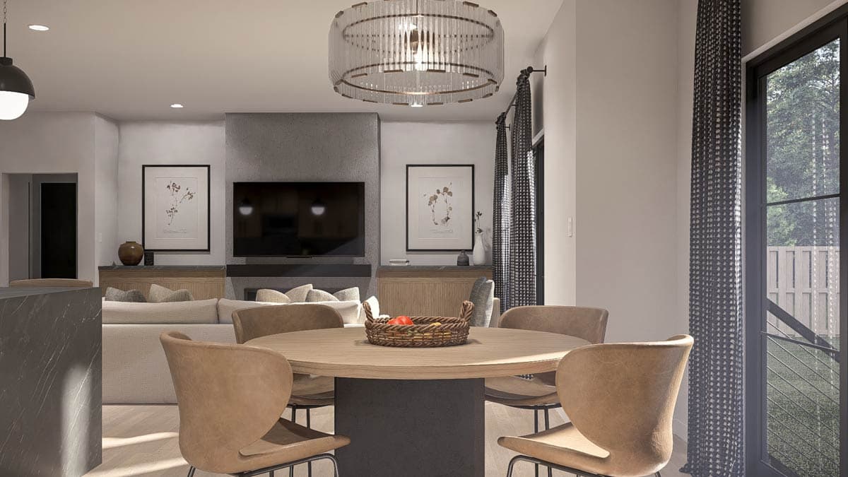 Interior rendering of a dining area with a round table and chairs, open to a living area with a fireplace and TV.
