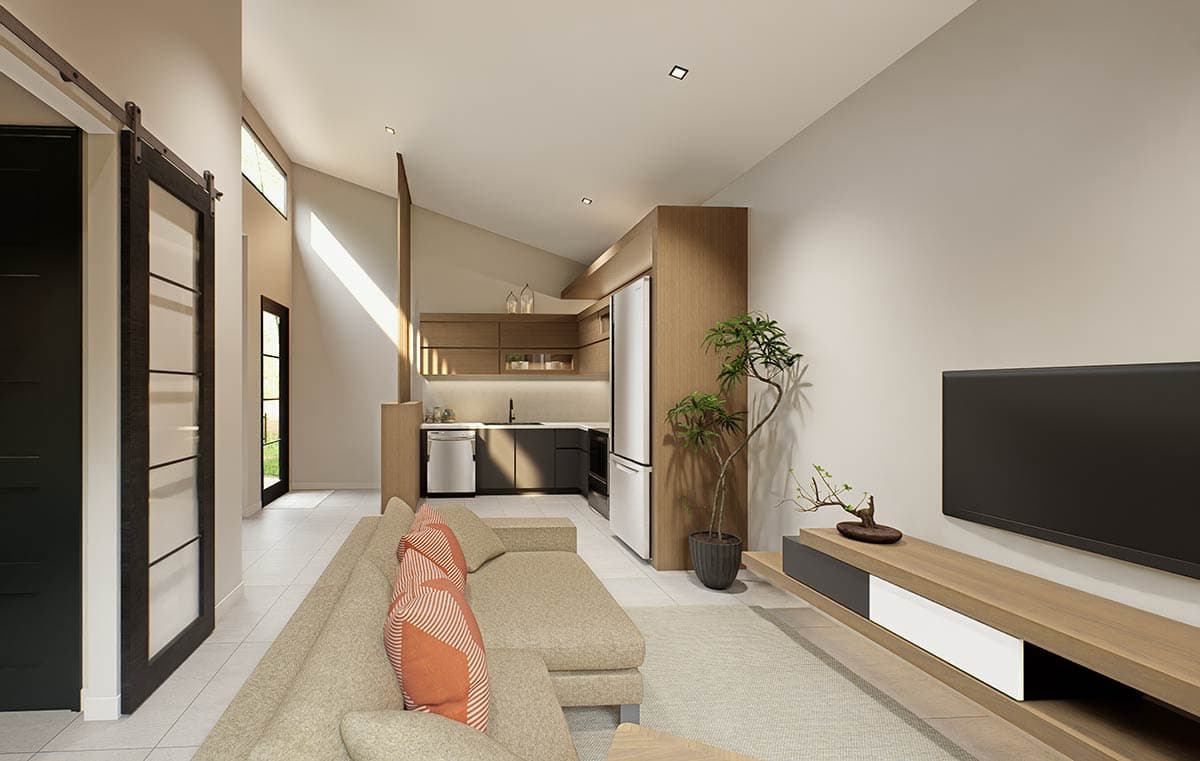Interior rendering of open-concept living space with vaulted ceiling, modern kitchen, and sliding barn door.
