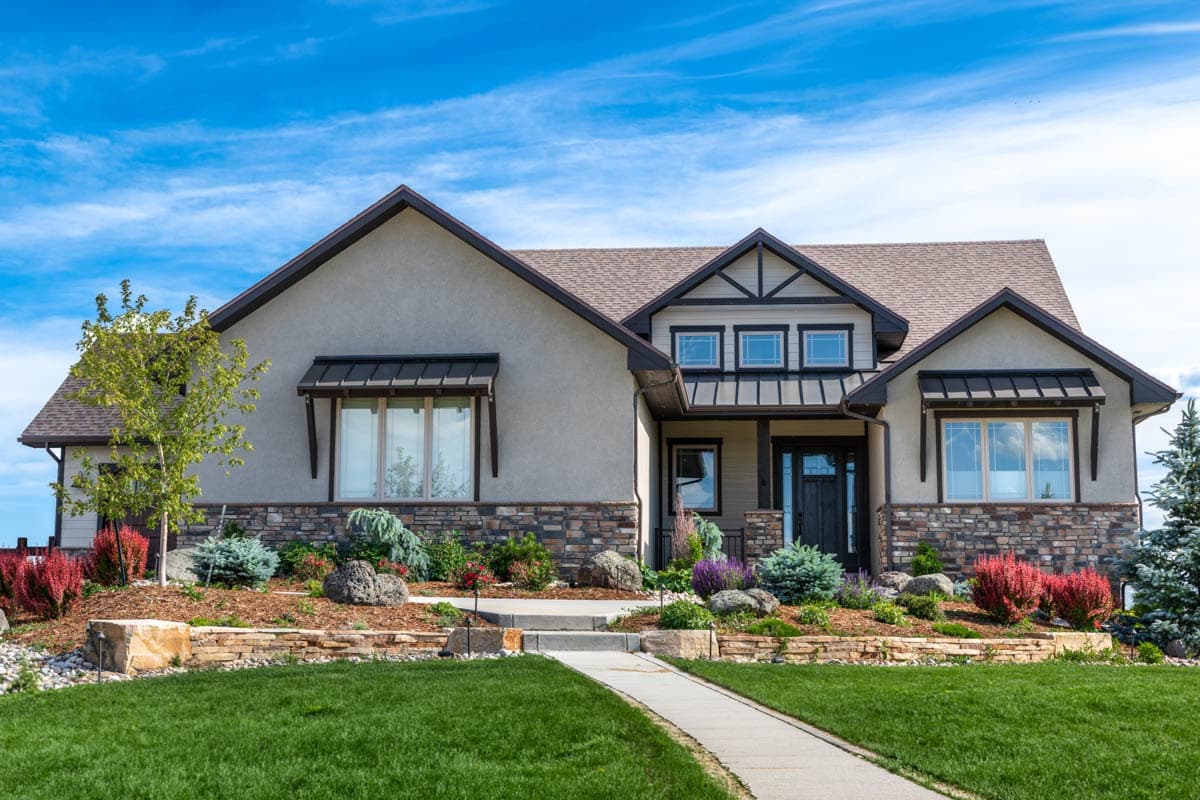 House plan exterior shows a two-story Modern Farmhouse with a gable roof, stone accents, and covered entry.