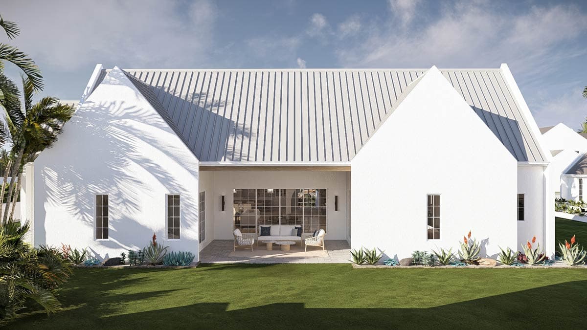 House plan exterior with white stucco, gabled metal roof, and large glass doors opening to a patio.