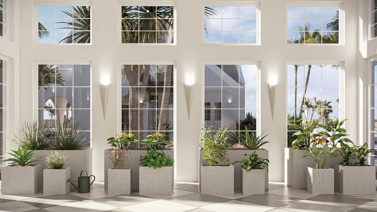 Interior rendering of a sunroom with large grid windows, planters, and architectural sconces.