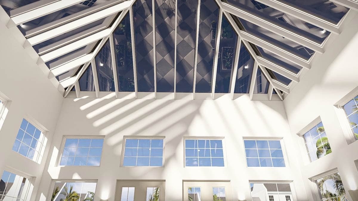 Interior rendering of a large room with a vaulted ceiling featuring a geometric skylight and multiple tall windows.