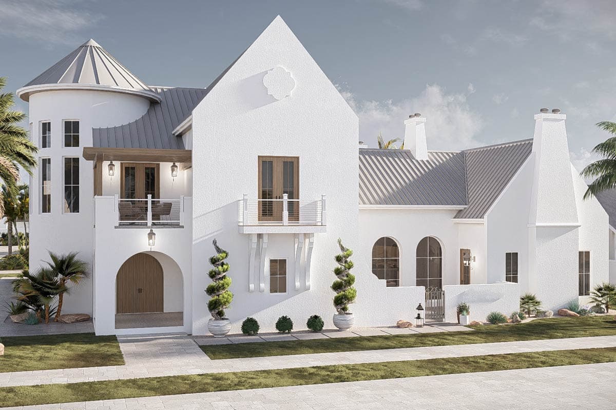 House plan exterior featuring a turret, stucco finish, metal roof, arched entry, and balconies.