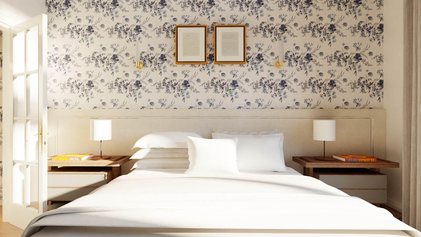 Bedroom rendering with floral wallpaper, a tufted headboard, nightstands with lamps, and French doors.