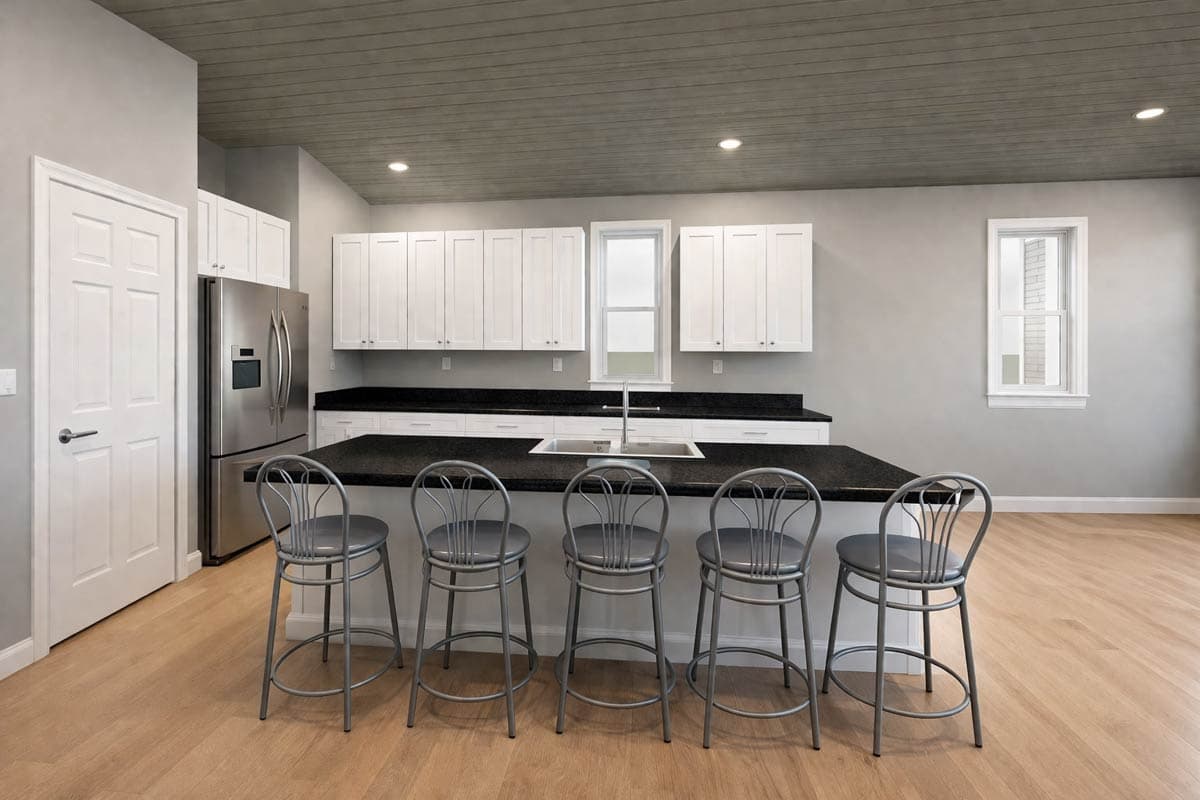 Kitchen with white cabinets, granite island, stainless steel refrigerator, and wood plank ceiling.