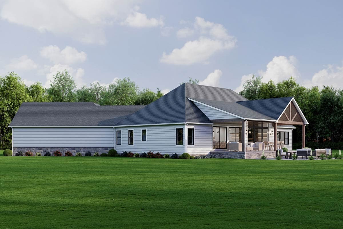 House plan exterior: Ranch style, one story, side porch with exposed beams, wide roof overhangs, and stone foundation.