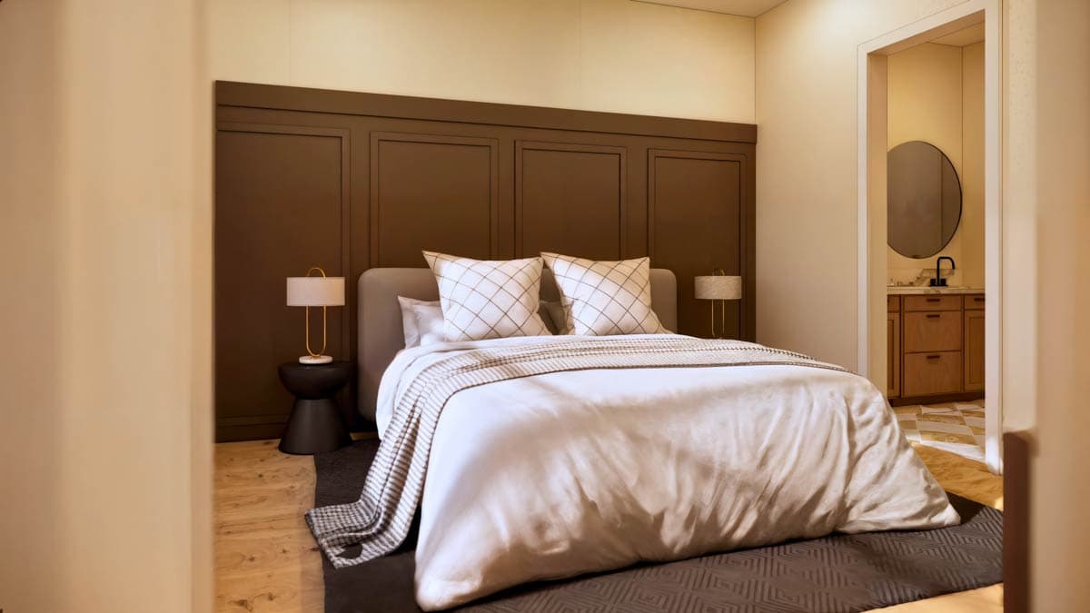 Bedroom rendering with a king bed, paneled headboard, nightstands with lamps, and an ensuite bath visible.