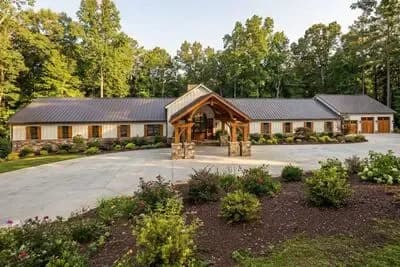 Luxury 9-Bedroom Barndominium House Plan with 4-Car RV Garage
