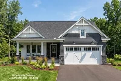 Traditional Farmhouse House Plan with Split Bedrooms and 2-Car Garage