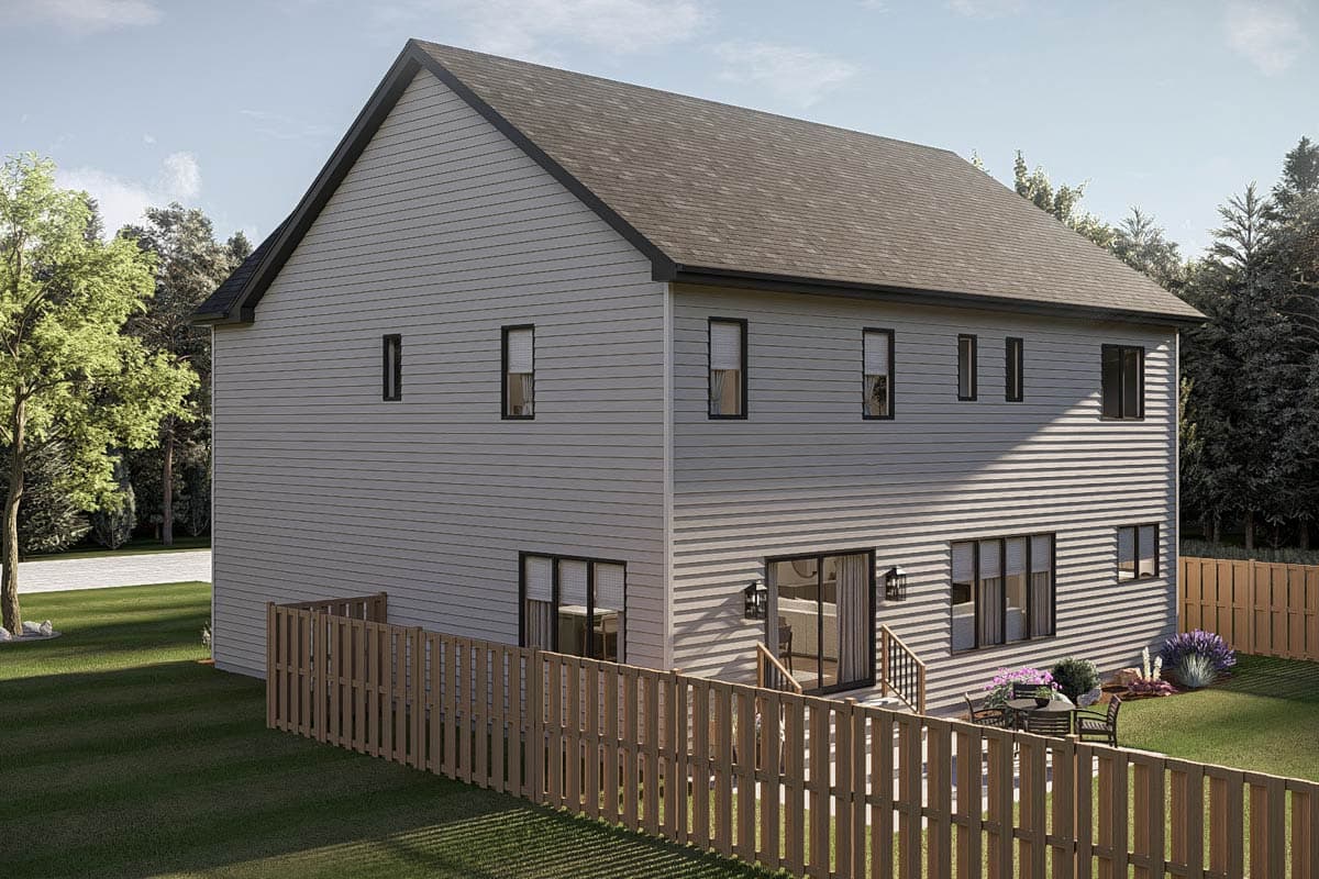 Two-story house plan exterior with vinyl siding, a gabled roof, and a rear deck with sliding doors.