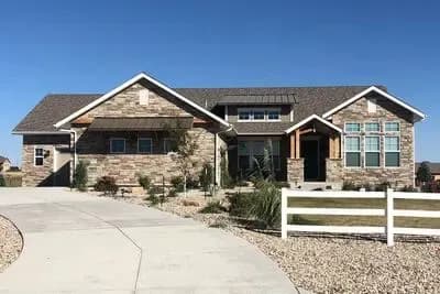 Craftsman Mountain House Plan with Three Bedrooms and Three-Car Garage