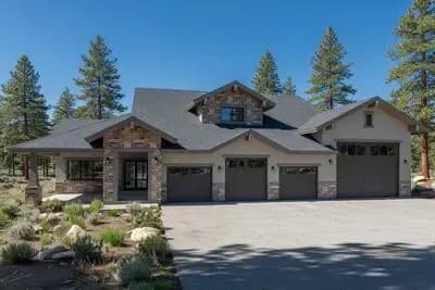 Modern Mountain House Plan with RV Garage and Vaulted Living Room