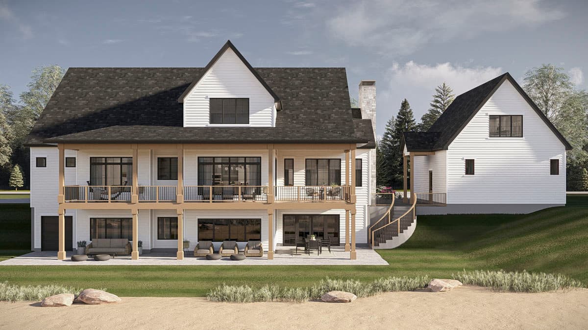 House plan exterior: Modern Farmhouse style with two stories, double-level deck, gables, and stone chimney.