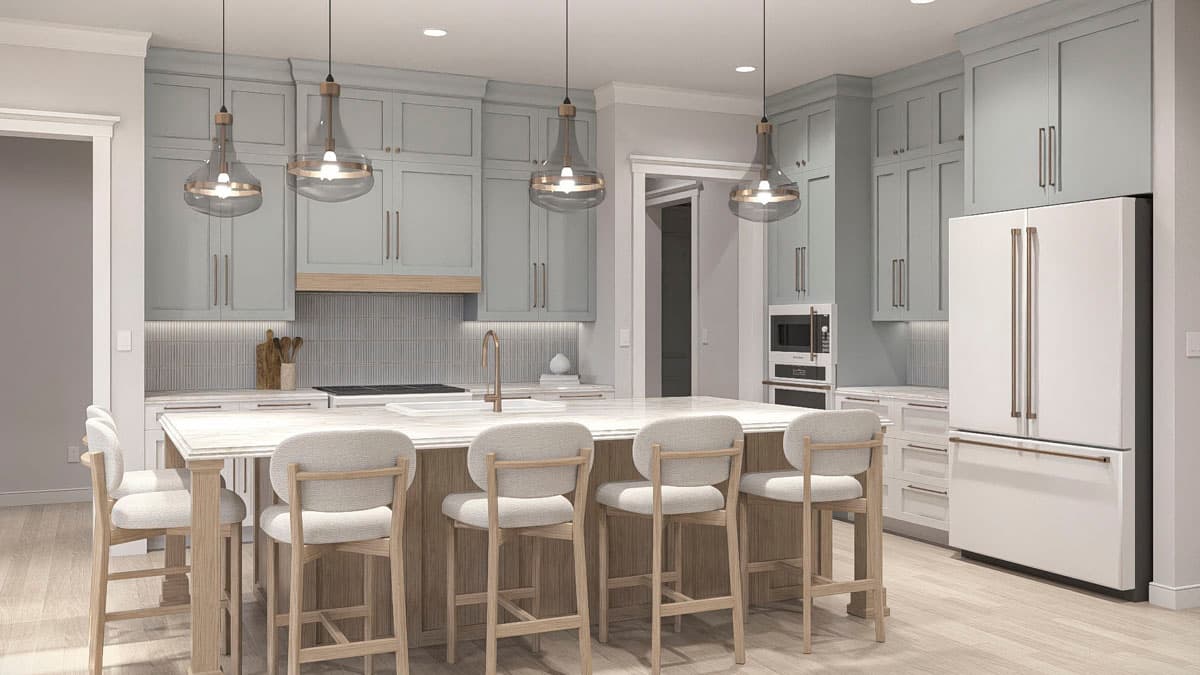 Kitchen interior with light blue cabinets, large island with bar stools, pendant lights, and white refrigerator.