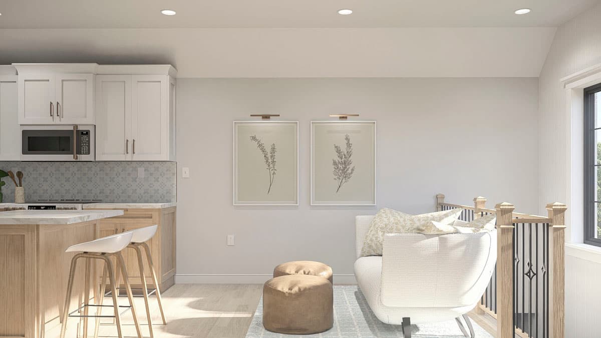 Interior rendering: Kitchen with white cabinets, island, and seating area with sofa and decorative art.