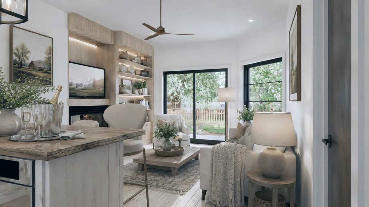 Living room with fireplace, built-in shelving, ceiling fan, and large sliding glass doors opening to backyard.
