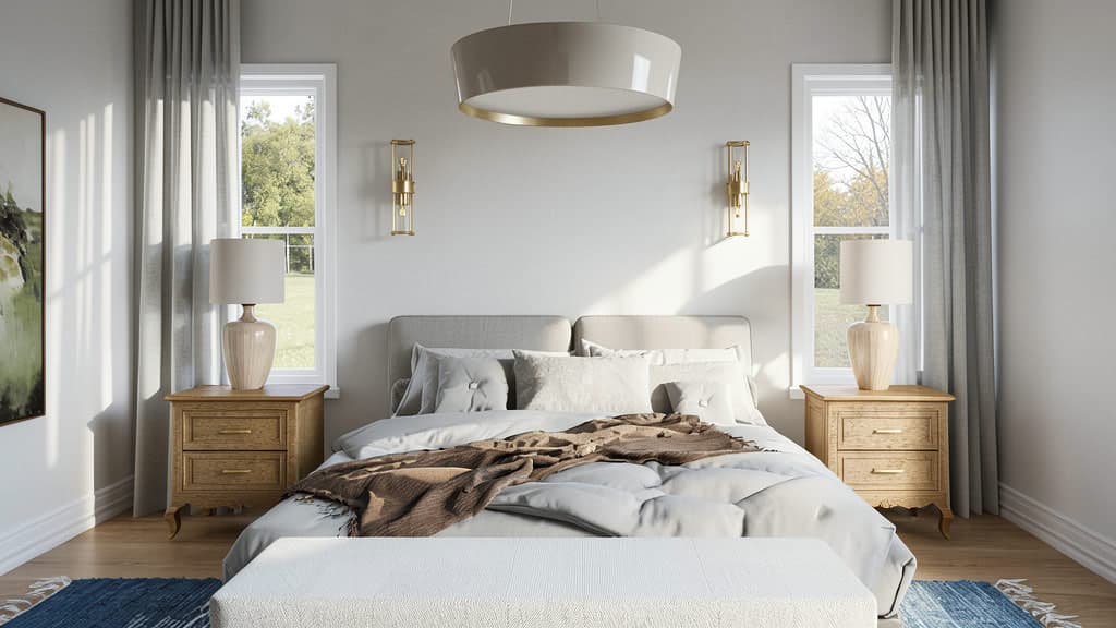 Bedroom with upholstered headboard, two nightstands, large pendant light, and twin wall sconces.
